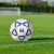 Piłka nożna turniejowa CoreX Pro podczas gry na mokrej nawierzchni 2 rozmiar 5 6.jpeg