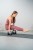 Airex-mata-Heartbeat-Fit-185-kobieta-ćwicząca-ręce.jpg