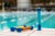 Zoggs-dive-sticks-stojące-na-brzegu-basenu.jpg